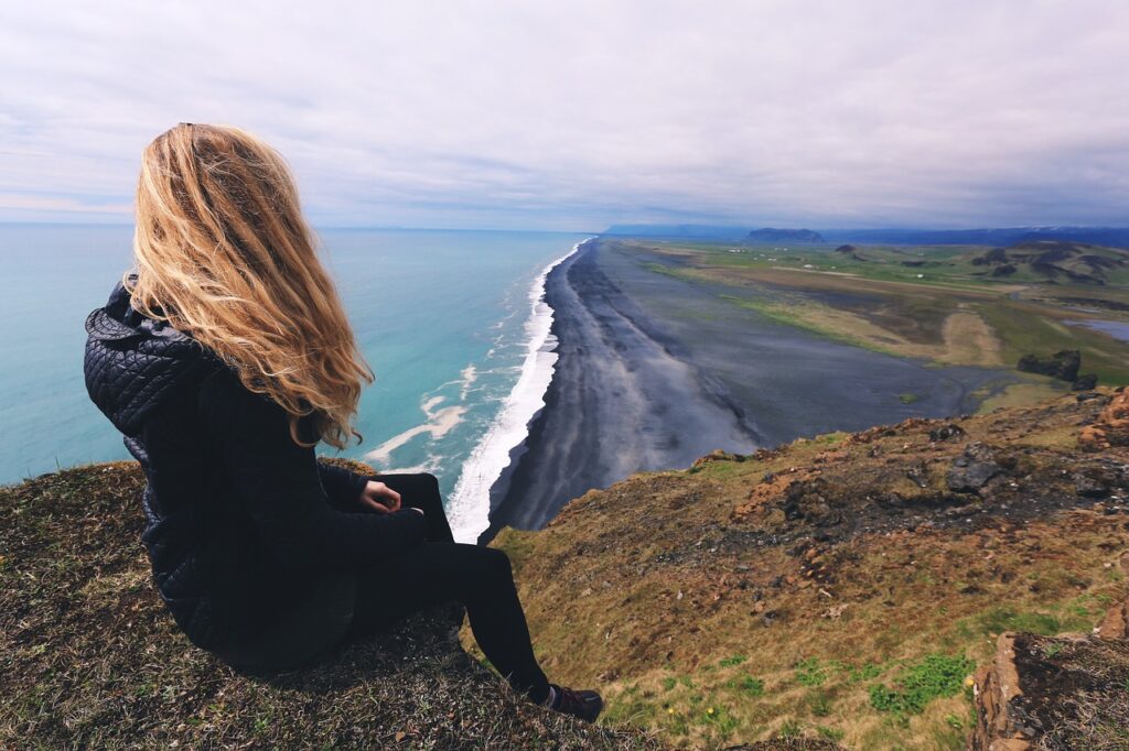woman, beach, cliff-1867881.jpg